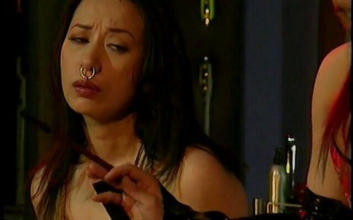 Asian mistress enjoys whipping her slave