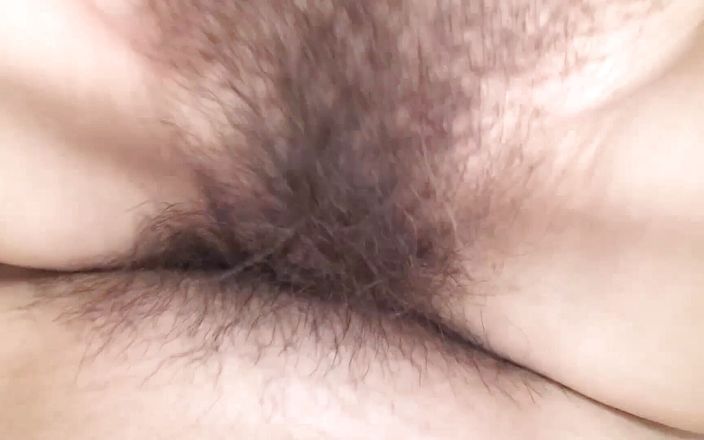 Asian with her puffy pussy having a good time