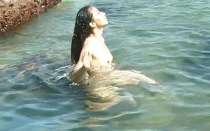 Girls playing in the shallows
