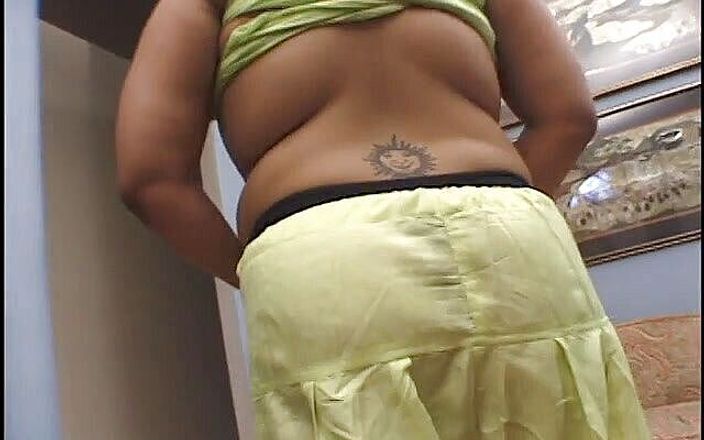 Indian big with a tattoo rides a cock in threesome