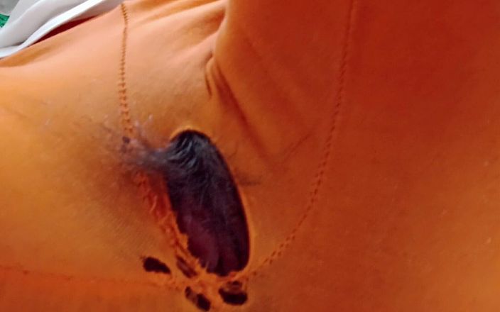 Indian Girl Working From Home with Hole in Her Pants. Under Table View