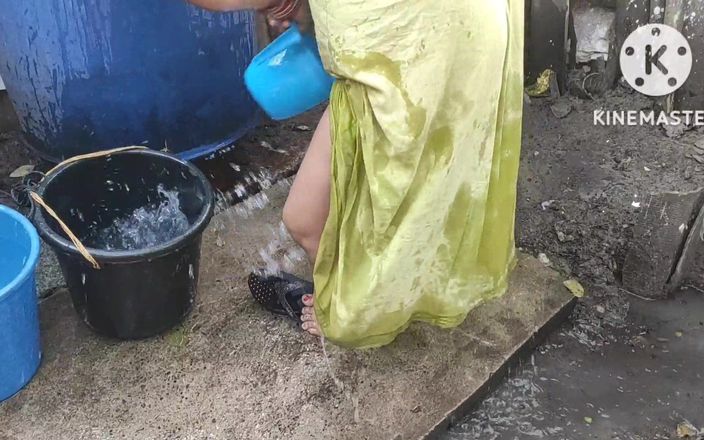 Indian house bhabhi bathing outside