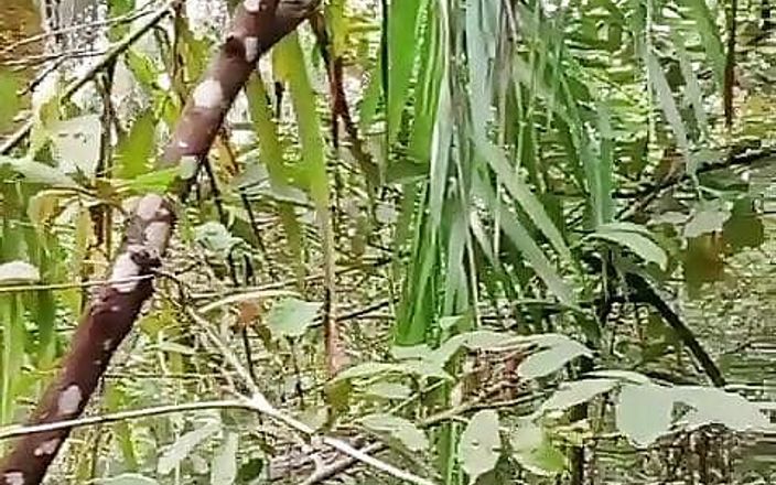 Mature Indonesian Woman Pissing in the Jungle